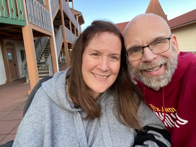 Jennifer and Dan Digmann smiling together while reflecting on healthy habits, discipline, and living well with Multiple Sclerosis.
